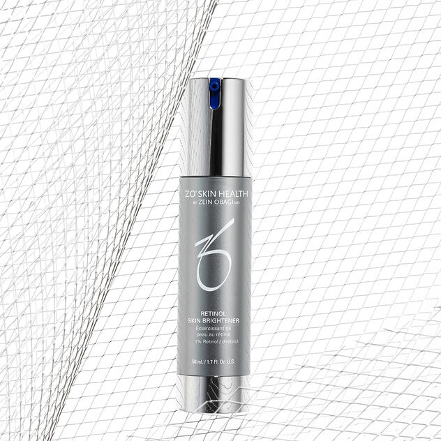 Retinol Skin Brightener against a mesh net